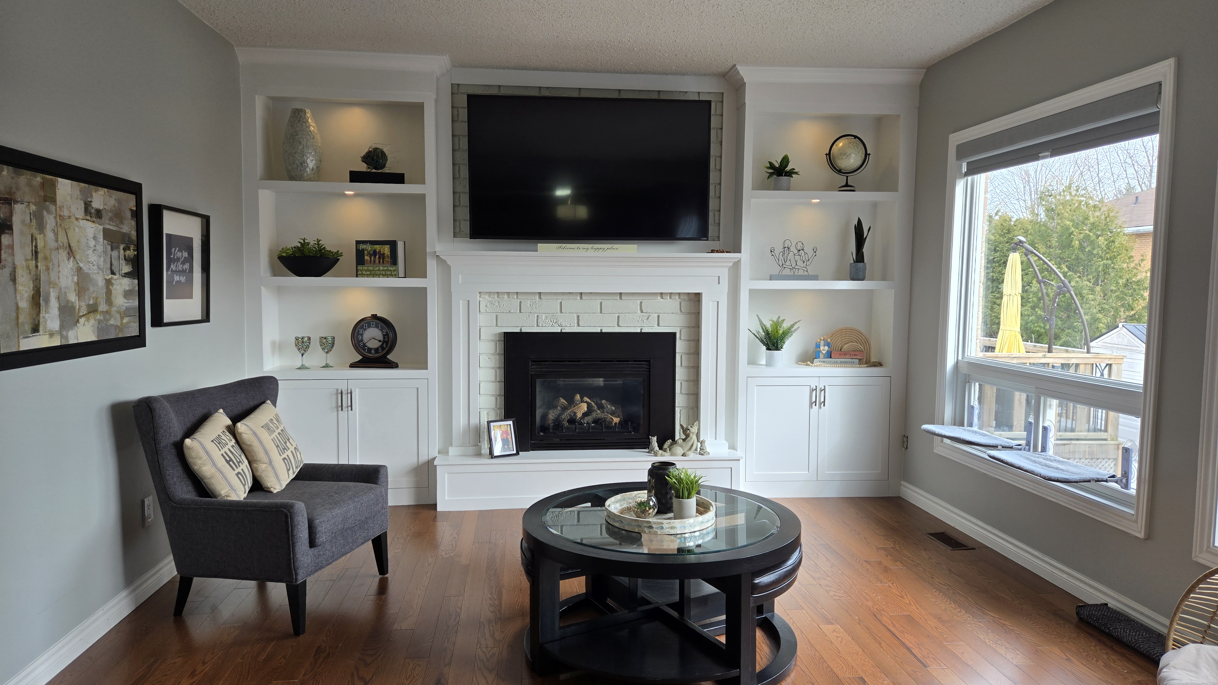 Living room built-ins with updated fireplace and bookcases